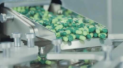 Automated high-speed capsule filling machine running cGMP production in our Delaware facility.